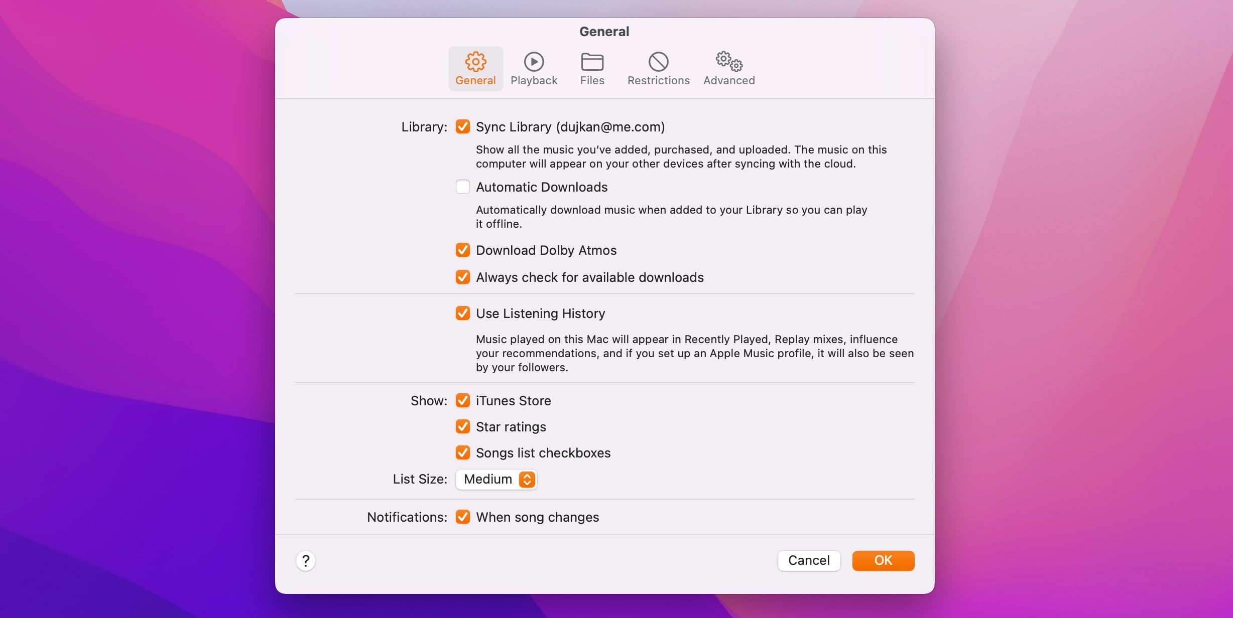 Une capture d'écran macOS Big Sur de l'application Apple Music avec l'option Sync Library activée dans les préférences